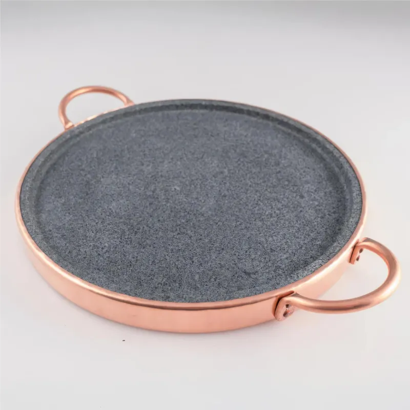 Piastra in pietra ollare Vulcanica da 29 cm con bordatura in rame ideale per cotture a fuoco lento e mantenimento del calore Navarini rame Spedizione Espresso